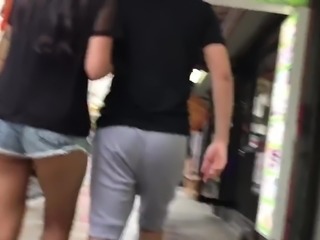 Asian teen in short jeans with ass cheeks out