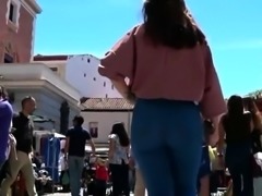 Street voyeur follows a sensuous amateur girl in tight jeans