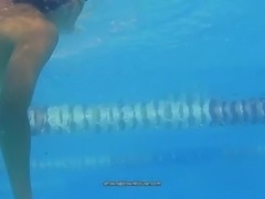 Nipple slip of a swimmer at the pool