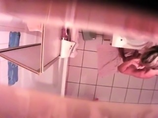 Sexy babe takes a shower and exposes herself on hidden cam