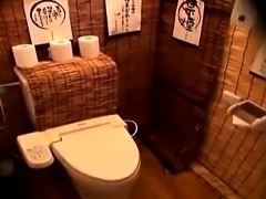 Pretty Japanese babe takes a cock for a ride in the toilet
