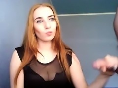 Busty redhead Anjii plays with her boobs and pussy