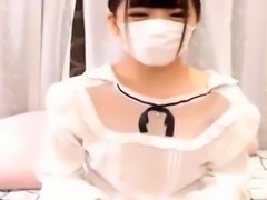 Japanese amateur giggles while watching guy jerk o
