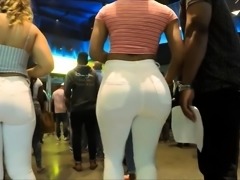 Voyeur follows a sexy amateur babe with a big round booty