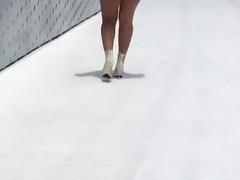 Girl Showing Ass Cheeks in Small Shorts (Big Phat Booty)