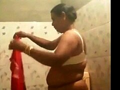 Desi Aunt spied on washing her chubby body