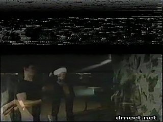 A scene from Vanessa Del Rio In Bondage, whipping in bondage with a collar and a gag
