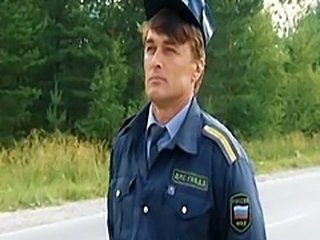 Russian policeman & blonde