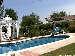 petite cutie stripping and sucking cock by the pool