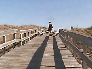 Flashing pussy at a public beach