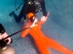 Kinky amateur lovers having some wild bondage fun underwater