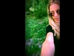 Busty and lusty blonde gets herself off in public park