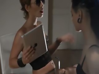 Tatto lesbs enjoying sex with strap on