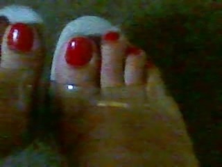 clear heels and red toe nails