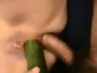 Sex bitch gets fucked by a veggie and a cock