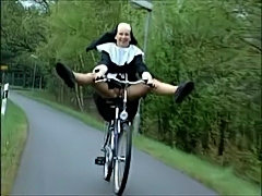 Nun on bike  free