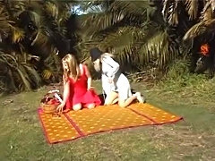Three Aussie girls have a picnic in Sydney's Centennial Park. And get very wet.